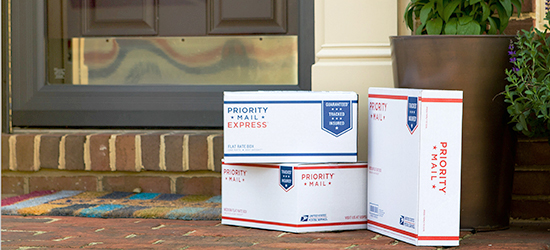 Boxes outside a residence for Skiesfreight package pickup.